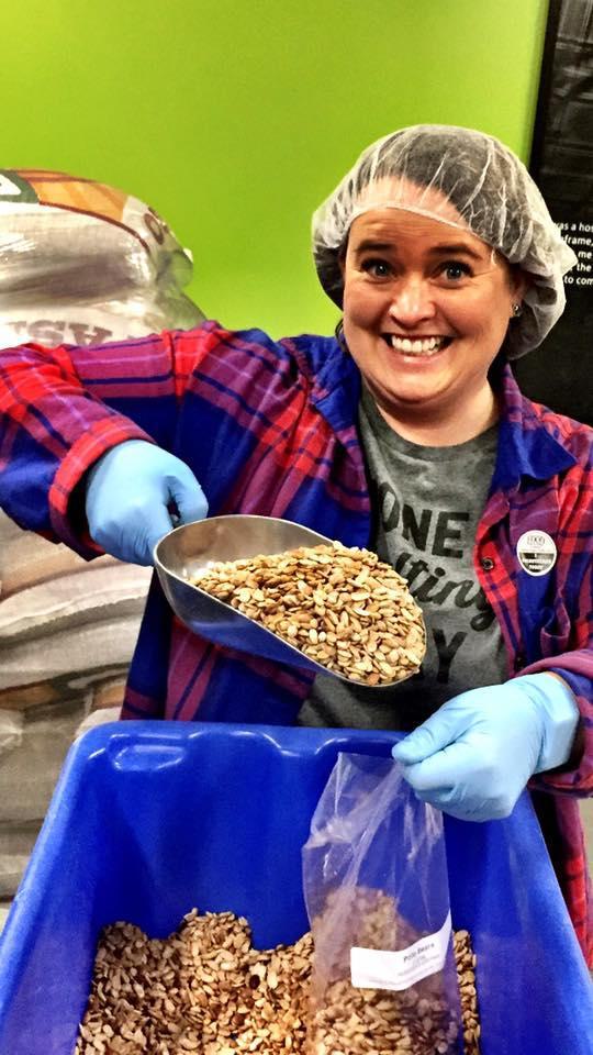 Volunteer dishing out food
