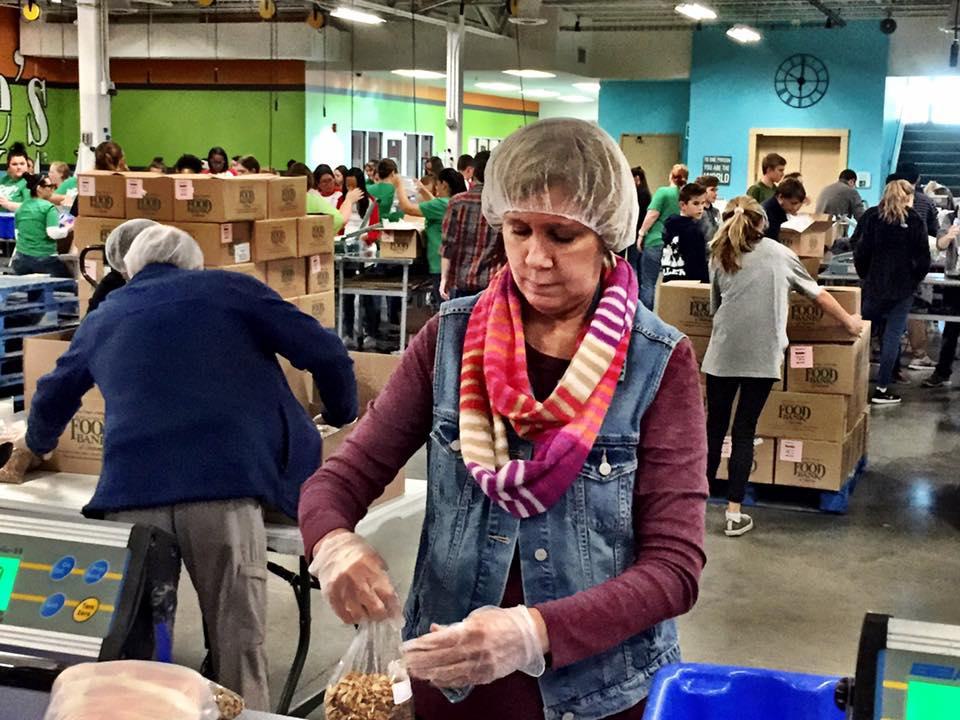Woman helping volunteer