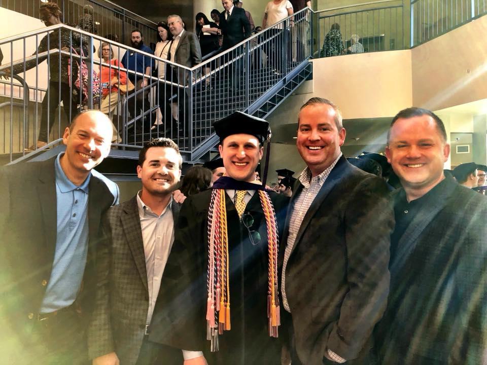 The Evans & Davis team with Taylor Kincanon at Tulsa University's College of Law graduation.