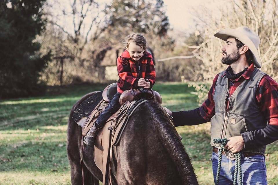 Father daughter on horse